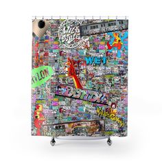 a shower curtain covered in lots of stickers and graffiti on the side of it