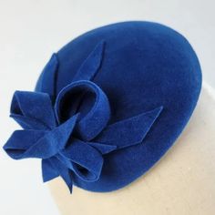 Detail of Royal Blue Winter Wedding Hat worn to the right of the head Blue Winter Wedding