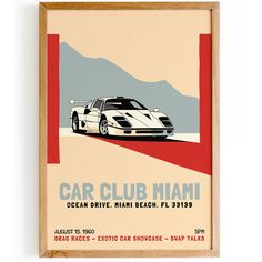 a car club miami poster hangs on the wall in front of a white background and red frame