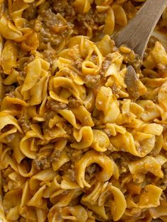 a casserole dish with meat and noodles in it, ready to be eaten