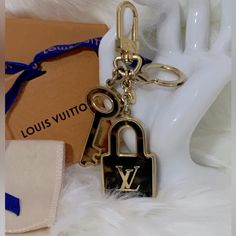 Beautiful And In Gorgeous Condition Louis Vuitton Tortoise Bag Charm. This Charm Has A Little Little Hairline Scratches But The Condition In New, Never Used Before, So Assuming The Scratches Were Made On Store Or During Transit. This Beautiful Bag Charm Includes : Coa Will Be Included In Package. Louis Vuitton Drawer Box Louis Vuitton Ribbon Louis Vuitton Gift Card Louis Vuitton Dust Bag And Of Course The Louis Vuitton Bag Charm. Please Not Low Balls! You Should Know What You Are Buying And Thes Luxury Bags With Logo Charm For Gift, Designer Gold Bag With Lock, Gold Shopping Bag With Lock, Gold Shopping Bag With Lock Detail, Gold Bag With Lock For Shopping, Gold Shopping Bags With Lock, Designer Gold Bag With Logo Charm, Designer Gold Bags With Logo Charm, Designer Travel Bag With Logo Charm