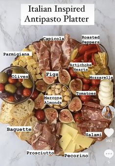 a platter filled with different types of food on top of a marble countertop