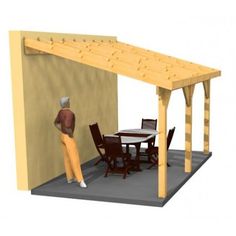 a person standing next to a table under a wooden structure