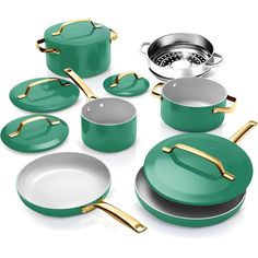 green pots and pans with gold handles