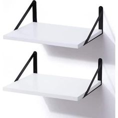 two white shelves with black handles on each shelf