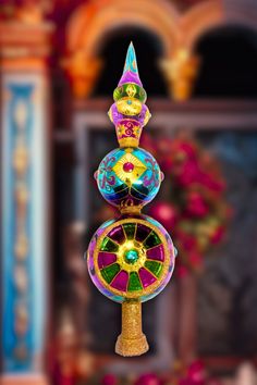 a colorful wind chime hanging from the ceiling