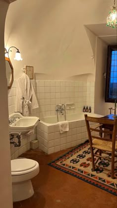 the bathroom is clean and ready to be used as a dining room or family room