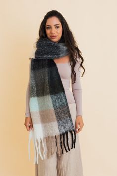 Wrap yourself in effortless coziness with the Cozy Breeze Oversized Fringe Scarf! A fall and winter must-have, this scarf features a timeless plaid pattern in soft, dreamy hues that bring both warmth and style to chilly days. Its oversized fit delivers all the snug feels, while the playful fringe adds just the right touch of flair. Whether you're sipping a pumpkin spice latte or strolling through a winter wonderland, this classic plaid scarf will keep you chic and cozy all season long! #lovemyle Scarf Cardigan, Trendy Fringe, Fall Winter Essentials, Winter Must Haves, Kimono Sweater, Cozy Scarf, Fall Scarves, Oversized Scarf, Fringe Scarf