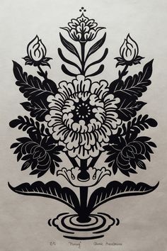 a black and white drawing of flowers in water