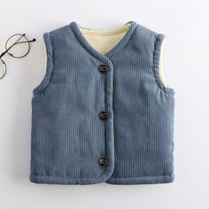 This item is for 1 x Waistcoat. Toddler Baby Corduroy Outerwear Coat Thermal Waistcoat Vest Jacket Body Warmer Please be reminded that due to lighting effects and monitor brightness/contrast setting, the color tone of the website photo and the actual item could be slightly different. This is in Asian sizing, smaller than western size e.g. UK, US, AU. Please check the measurements carefully before making a purchase. If you are not sure which size to buy, please provide height and weight, we will recommend a suitable size. Size: 1-8 Years 1-2 T (Label size 80): length 13.4 in/34cm, bust 25.2 in/64cm, shoulder 9.8 in/25cm, suggest height 29.5 in/75 cm 2-3 T (Label size 90): length 14.1 in/36cm, bust 26.7 in/68cm, shoulder 10.6 in/27cm, suggest height 33.4 in/85 cm 3-4 T (Label size 100): leng Toddler Vest, School Clothing, Kids Vest, Boys Vest, Baby Boy Quilts, Girls Vest, Baby Outerwear, Vest Waistcoat, Girls Quilts