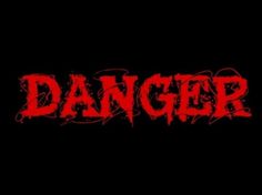 the word danger written in red on a black background