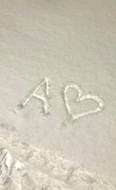 the word i love you written in the snow