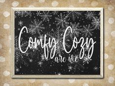 a black and white photo with snowflakes on it that says, comfy cosy are we?