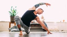 a man is doing yoga on the floor