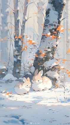 two white rabbits laying in the snow next to some trees and orange leaves on them