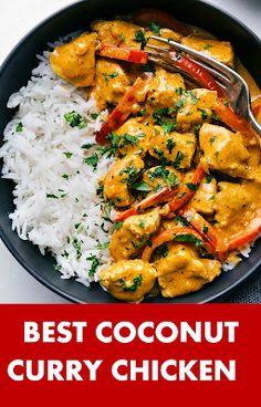 coconut chicken curry with white rice in a black bowl