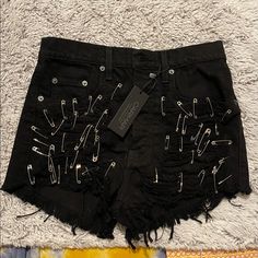 Nwt Carmar Denim Distressed Safety Pin High Waisted Shorts Size 26 These Grunge Black Shorts Are Sure To Catch The Eyes Of Anyone Sight. Let Your Outfit Be As You Are And Stand Out! Crust Punk Shorts, Edgy Cutoff Bottoms With Belt Loops, High Waist Ripped Punk Bottoms, Punk High Waist Ripped Bottoms, Punk High Rise Ripped Bottoms, Edgy Ripped Fitted Jean Shorts, Edgy High Rise Fitted Jean Shorts, Edgy High-rise Fitted Jean Shorts, Ripped Punk Bottoms For Night Out