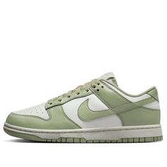 The (WMNS) Nike Dunk Low Next Nature 'Olive Aura' is a stylish sneaker that combines classic design with eco-conscious materials. This shoe features a fresh color scheme, with a white base and olive aura green leather overlays on the Swoosh insignias, laces, liner, and outsole. Notably, the Nike Dunk Low Next Nature is made from at least 20% recycled materials by weight, aligning with Nike’s “Move to Zero” initiative. The white Nike Grind midsole adds a clean finishing touch. Nike Dunk Low Medium Olive, Nike X Travis Scott, Low Air Jordan 1, Jordan 8, Adidas Spezial, Dunks Nike, Jordan 2, Nike Brand, Nike Dunk High