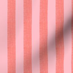 an orange and pink striped fabric with white stripes