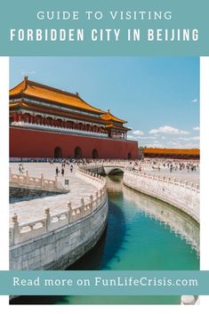 people are walking around in front of the forbidden city wall and water canal, which is surrounded by white stone walls