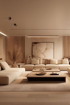 a living room with white couches and tables