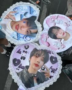 three heart shaped paper plates with pictures of people in the middle one has an embellishment on it