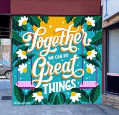 a sign on the side of a building that says together we can do great things