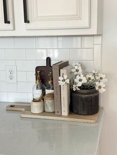 the kitchen counter is clean and ready to be used as a shelf for personal care items