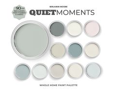 the paint palettes are all in different colors and sizes, including light blue, gray,