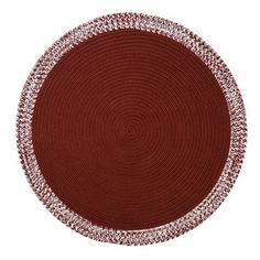 a red and white round rug on a white background with an oval design in the middle