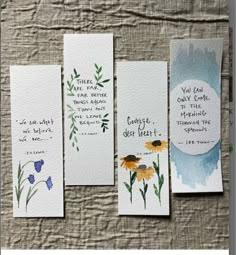 four bookmarks with watercolor flowers on them and some words written in the middle