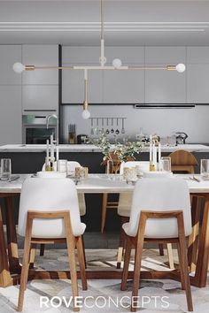 a dining room table and chairs in front of an open kitchen