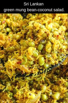 green mung bean - coconut salad is served on a plate with a wooden spoon