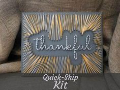 a metal sign that says thank with the words,'thanks quick ship kit '