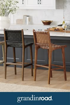 two wooden chairs sitting on top of a kitchen counter