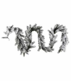 the word nui spelled with pine branches on a white background in black and white