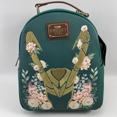 Disney Leather Backpack For Disney Trips, Disney Green Backpack, Disney Leather Backpack For School, Disney Leather School Backpack, Disney Green Travel Bags, Green Disney Backpack, Green Disney Travel Bag, Green Disney Bags For Everyday Use, Disney Style Backpack With Zipper Closure