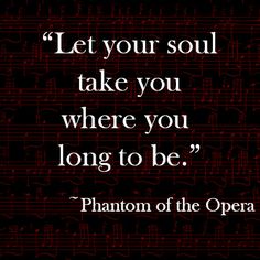 a quote from the opera, written in black and white on a red background with music notes