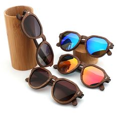 Hexagon shape Wooden Sunglasses, Customise your lens and Choose your case or box style for your Wood sunglasses Lens width: 51mm Lens height: 44mm Lenstype : UV400, polarized Wood: Bamboo Included: Sunglasses, Glasses case, Glasses cloth, Glasses bag, Polarized test cardUpgrade your wooden sunglasses with our personalized engraving service, creating a truly one-of-a-kind accessory or gift! Follow the link below to purchase the custom engraving and elevate your wooden sunglasses to a whole new le Adjustable Sunglasses With Mirrored Lenses For Gift, Adjustable Sunglasses With Mirrored Lenses As A Gift, Wood Sunglasses, Wooden Sunglasses, Sunglass Lenses, Wooden Art, Hexagon Shape, Glasses Case, Custom Engraving