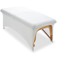 a white table with wooden legs on it