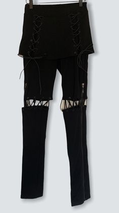 NEW Goth Lace Up Leggings Skirt Available in Small Med or Large Size XS/S - 25.5 inch waist Size Med - 27 inch waist Size Large- 28.5 inch waist Legging with skirt Lacing and zippers on legs Lacing also on skirt Perfect for goth punk alt egirl mallgoth cybergoth cyberpunk metal Fitted Grunge Bottoms For Concerts, Stretch Grunge Bottoms For Streetwear, Alternative Black Stretch Bottoms, Alternative Style Black Stretch Bottoms, Alternative Style Stretch Black Bottoms, Stretch Gothic Bottoms For Cosplay, Gothic Stretch Bottoms For Cosplay, Black Stretch Rock Bottoms, Black Stretch Emo Bottoms