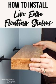 a person holding a wooden board with the words how to install live edge floating shelves