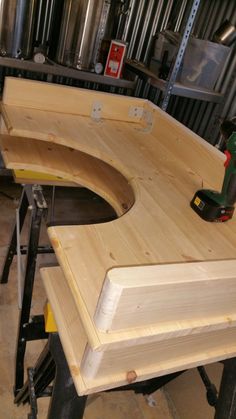 a work bench made out of plywood in a shop