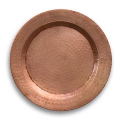 an empty copper plate on a white background