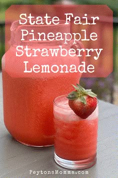 two glasses filled with strawberry lemonade sitting on top of a table