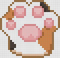 a cross stitch pattern with an image of a dog's face in the center