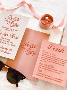 an orange and pink wedding suite with sunglasses