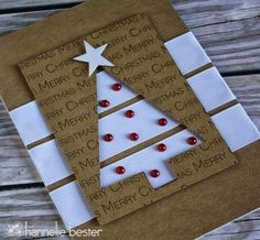 a christmas tree made out of brown paper with red and white beads on the bottom