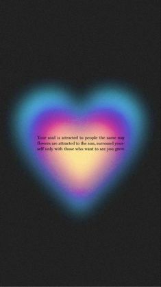 a colorful heart with a quote on it