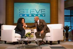 a man and woman sitting on couches in front of a television screen with the words steve harvey